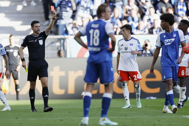 Referee Harm Osmers shows Bernardo of TSG Hoffenheim a yellow-red card—red card, ejection, two-yellow-card dismissal—during the Bundesliga match between TSG 1899 Hoffenheim and Hamburger SV at the PreZero Arena, Sinsheim, Germany, on October 10, 2026, in action during the Bundesliga match between TSG 1899 Hoffenheim and Hamburger SV at the PreZero Arena, Sinsheim, Germany, on October 10, 2026. DFB and DFL regulations prohibit any use of photographs as image sequences and or quasi-video, Copyright: HMBxMedia xHeikoxBecker