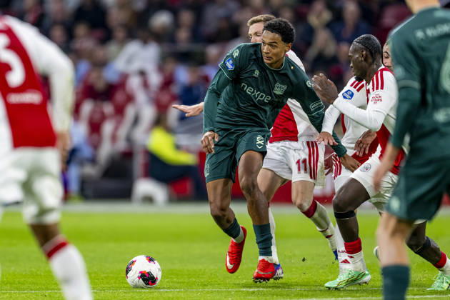 AMSTERDAM l NEC Nijmegen defender Kevin Kers and AFC Ajax Amsterdam defender Jorthy Mokio during the Vriendenloterij Eredivisie match between Ajax and NEC at the Johan Cruijff ArenA on October 10, 2026, in Amsterdam, Netherlands. Photo by DeFodi Images