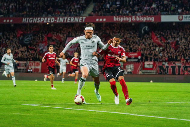 Fabian Reese, VfL Wolfsburg, 11, and Ioannis Masouras, 1 FC Nuremberg, 21, GER, 1 FC Nuremberg vs. VfL Wolfsburg, Soccer, 2. Bundesliga, Matchday 7, 2026–2027 Season, October 10, 2026, DFL regulations prohibit any use of photographs as image sequences and or quasi-video, GER, 1 FC Nuremberg vs. VfL Wolfsburg, Soccer, 2. Bundesliga, Matchday 7, 2026–2027 Season, October 10, 2026, Nuremberg Copyright: xEibner-Pressefoto MaxxVogelx EP_MVL
