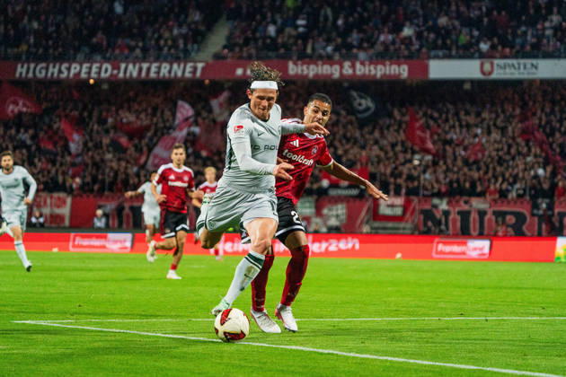 Fabian Reese, VfL Wolfsburg, 11, and Ioannis Masouras, 1 FC Nuremberg, 21, GER, 1 FC Nuremberg vs. VfL Wolfsburg, Soccer, 2. Bundesliga, Matchday 7, 2026–2027 Season, October 10, 2026, DFL regulations prohibit any use of photographs as image sequences and or quasi-video, GER, 1 FC Nuremberg vs. VfL Wolfsburg, Soccer, 2. Bundesliga, Matchday 7, 2026–2027 Season, October 10, 2026, Nuremberg Copyright: xEibner-Pressefoto MaxxVogelx EP_MVL