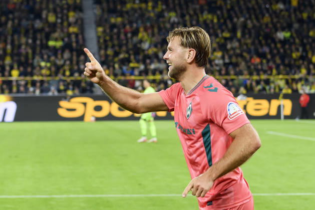 Niclas Fuellkrug of SV Werder Bremen celebrates his goal, which tied the score at 2–2, during the Bundesliga match between Borussia Dortmund and SV Werder Bremen at Signal Iduna Park on October 9, 2026, in Dortmund, Germany. Photo by Max Maiwald, DeFodi Images. Niclas Fuellkrug of SV Werder Bremen celebrates after scoring his team’s second goal during the Bundesliga match between Borussia Dortmund and SV Werder Bremen at Signal Iduna Park on October 9, 2026 in Dortmund, Germany. Photo by Max Maiwald, DeFodi Images. DFB and DFL regulations prohibit any use of photographs as image sequences and or quasi-video. Photo by Max Maiwald, DeFodi Images.