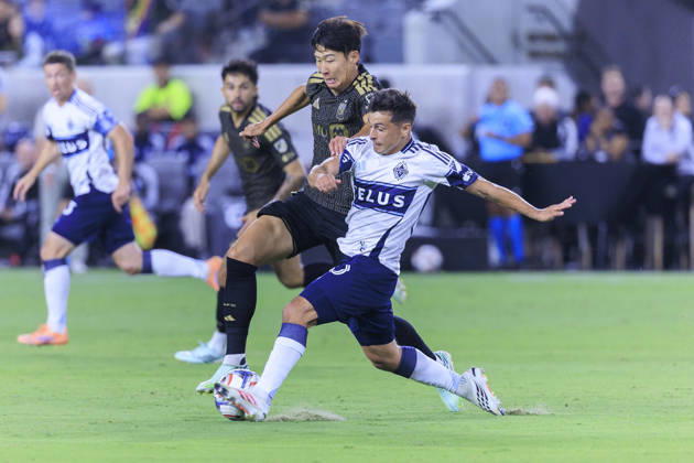 October 10, 2026, Los Angeles, California, USA: Son Heung-Min 7 of the Los Angeles Football Club and Andres Cubas 20 of the Vancouver Whitecaps struggle for possession of the ball during their regular season MLS, Fussball Herren, USA game on Saturday October 10, 2026 at the BMO Stadium in Los Angeles, California. ARIANA RUIZ PI LAFC Vs. Vancouver Whitecaps  - ZUMAp124 20261010_zaa_p124_008 Copyright: xArianaxRuizx