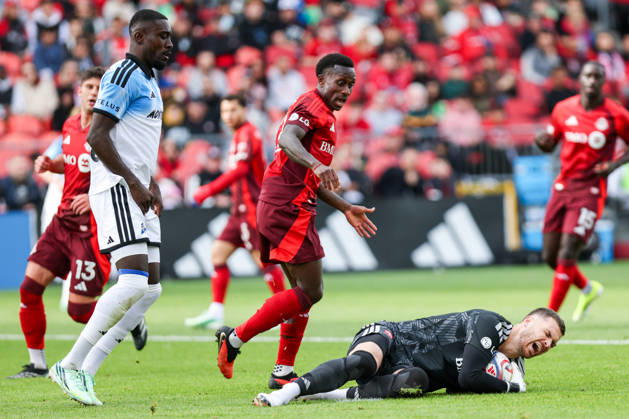 Toronto FC v CF Montreal Luka Gavran 1 of Toronto FC reacts in pain after collecting the ball from Prince Owusu 9 of CF Montreal, with Richie Laryea 22 of Toronto FC nearby, during a Major League Soccer match between Toronto FC and CF Montreal at BMO Field in Toronto, Ontario, Canada, on October 10, 2026. Toronto Ontario Canada  Copyright: xIndrawanxKumalax originalFilename:kumala-majorlea261010_npZEf