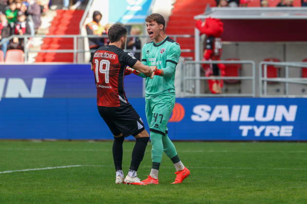 Ingolstadt, Germany, October 11, 2026, 3rd League 2026–2027, Matchday 8: FC Ingolstadt 04 vs. SV Wehen Wiesbaden. Pictured, second from left: FCI goalkeeper David Klein smiling on the field after Wehen missed a penalty kick. DFB and DFL regulations prohibit any use of photographs as image sequences and or quasi-video Copyright: xFotostandx xSchäferx