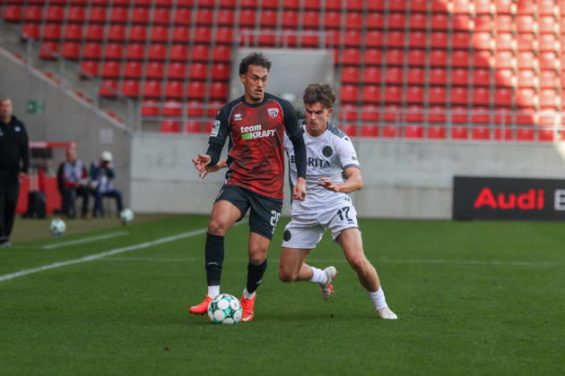 Ingolstadt, Germany, October 11, 2026, 3rd League 2026–2027, Matchday 8: FC Ingolstadt 04 vs. SV Wehen Wiesbaden. Pictured from left, in a tackle: Nishan Velupillay (FCI) and Ben Nink (SVWW). DFB and DFL regulations prohibit any use of photographs as image sequences and or quasi-video Copyright: xFotostandx xSchäferx