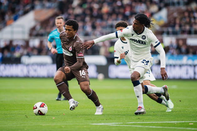 2. Bundesliga: FC St. Pauli vs. Karlsruher SC, October 11, 2026; Joel Fujita (FC St. Pauli, No. 16) vs. Sandro Tromoulet (Karlsruher SC, No. 24); Soccer, 2. Bundesliga, Matchday 7: FC St. Pauli vs. Karlsruher SC on October 11, 2026, at Millerntor Stadium, Hamburg. DFL regulations prohibit any use of photographs as image sequences and or quasi-video. Copyright: xBEAUTIFULxSPORTS Tonhäuserx