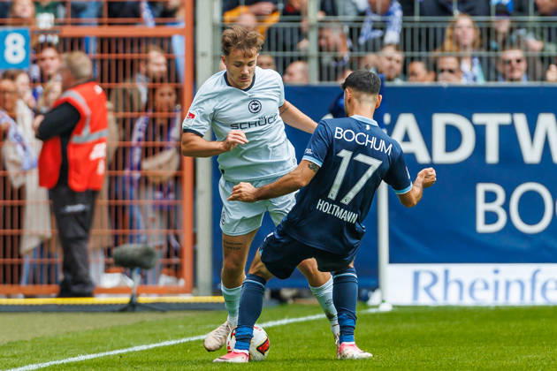 Felix Hagmann of DSC Arminia Bielefeld and Gerrit Holtmann of VfL Bochum battle for the ball during the 2. Bundesliga match between VfL Bochum and Arminia Bielefeld at Ruhrstadion on October 11, 2026, in Bochum, Germany. Photo by Mario Hommes, DeFodi Images. Felix Hagmann of DSC Arminia Bielefeld and Gerrit Holtmann of VfL Bochum battle for the ball during the 2. Bundesliga match between VfL Bochum and Arminia Bielefeld at Vonovia Ruhrstadion on October 11, 2026 in Bochum, Germany. Photo by Mario Hommes, DeFodi Images. DFB and DFL regulations prohibit any use of photographs as image sequences and or quasi-video. Photo by Mario Hommes, DeFodi Images