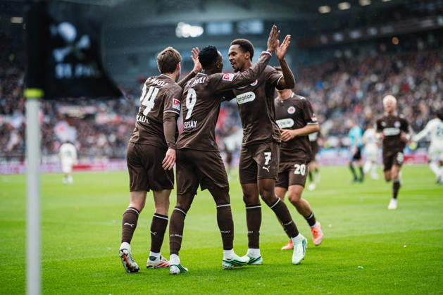 2. Bundesliga: FC St. Pauli vs. Karlsruher SC, October 11, 2026, GOAL, CELEBRATION by Abdoulie Ceesay of FC St. Pauli, 9–1–0; pictured here are Connor Metcalfe of FC St. Pauli, No. 24, and Youssoupha Niang of FC St. Pauli, No. 7; soccer, 2. Bundesliga, Matchday 7: FC St. Pauli vs. Karlsruher SC on October 11, 2026, at Millerntor Stadium, Hamburg. DFL regulations prohibit any use of photographs as image sequences and or quasi-video. Copyright: xBEAUTIFULxSPORTS Tonhäuserx