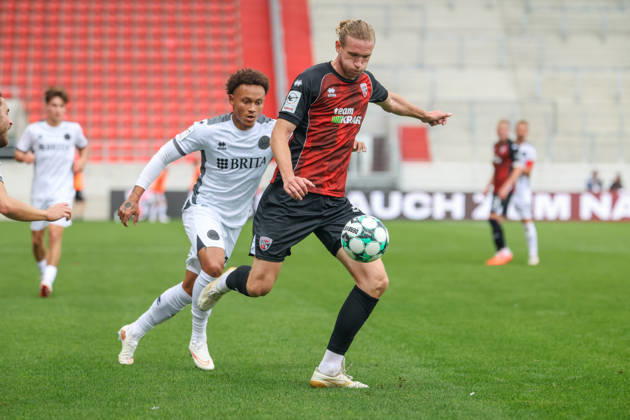 Ingolstadt, Germany October 11, 2026 3rd League 2026–2027 Matchday 8 FC Ingolstadt 04 vs. SV Wehen Wiesbaden Pictured from left in a tackle: Roberto Massimo (SVWW) and Vinko Sapina (FCI). DFB and DFL regulations prohibit any use of photographs as image sequences and or quasi video Copyright: xFotostandx xSchäferx