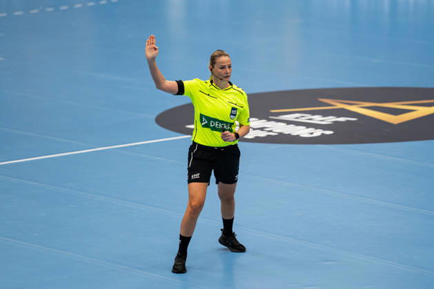 HSG Blomberg Lippe (GER) vs. Odense Handbold (DEN), Handball, EHF Champions League Women, Group Stage, October 11, 2026, 2026–2027 Season, Referee Andrea Alejandra Pepe (Lemgo) calls a time-wasting foul at the Lemgo Phoenix Contact Arena, Germany