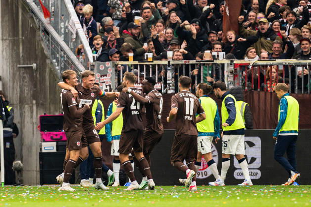 Goal to make it 2–0: Lars Ritzka (FC St. Pauli), 21 celebrates with David Nemeth (FC St. Pauli), 04, Abdoulie Ceesay (FC St. Pauli), 09, Arkadiusz Pyrka (FC St. Pauli), 11, GER, FC St. Pauli vs. Karlsruher SC, Soccer, 2. Bundesliga, Matchday 7, 2026–2027 season, October 11, 2026 DFL regulations prohibit any use of photographs as image sequences and or quasi-video GER, FC St. Pauli vs. Karlsruher SC, soccer, 2. Bundesliga, Matchday 7, 2026–2027 season, October 11, 2026, Hamburg Copyright: xEibner-Pressefoto MaxxVincenx EP_MVN