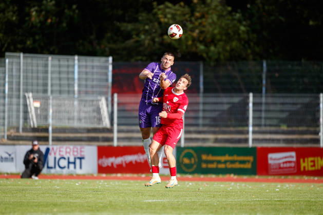 Left: Patrick Kapp (Aue) vs. Felix Heim (Greifswald), GER; Greifswalder FC vs. FC Erzgebirge Aue; Soccer; Men; Northeast Regional League; Matchday 12; 2026–2027 Season; October 11, 2026, Greifswald Volksstadion, Mecklenburg-Western Pomerania, Germany
