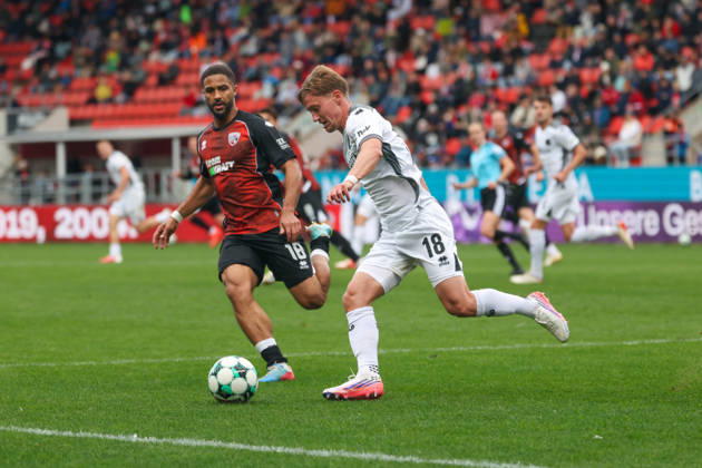 Ingolstadt, Germany October 11, 2026 3rd League 2026–2027 Matchday 8 FC Ingolstadt 04 vs. SV Wehen Wiesbaden Pictured from left: Keanan Bennetts (FCI) and Fabian Greilinger (SVWW) in a tackle. DFB and DFL regulations prohibit any use of photographs as image sequences and or quasi-video Copyright: xFotostandx xSchäferx