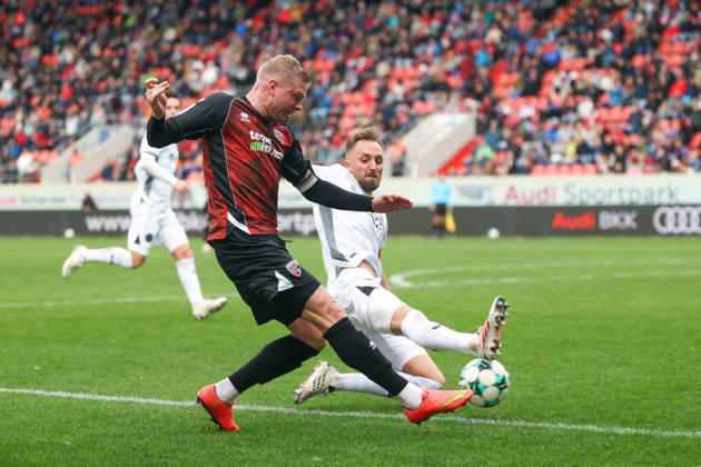 Ingolstadt, Germany, October 11, 2026, 3rd League 2026–2027, Matchday 8: FC Ingolstadt 04 vs. SV Wehen Wiesbaden. Pictured, from left, in a tackle: Lars Lokotsch (FCI) and Florian Hübner (SVWW). DFB and DFL regulations prohibit any use of photographs as image sequences and or quasi-video Copyright: xFotostandx xSchäferx