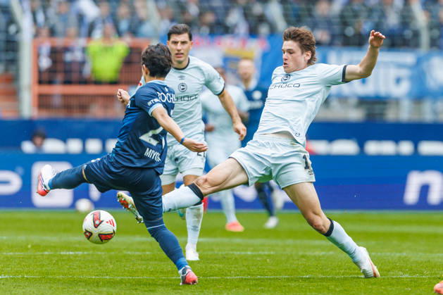 Koji Miyoshi of VfL Bochum and Maximilian Grosser of DSC Arminia Bielefeld battle for the ball during the 2. Bundesliga match between VfL Bochum and Arminia Bielefeld at Ruhrstadion on October 11, 2026, in Bochum, Germany. Photo by Mario Hommes, DeFodi Images. Koji Miyoshi of VfL Bochum and Maximilian Grosser of DSC Arminia Bielefeld battle for the ball during the 2. Bundesliga match between VfL Bochum and Arminia Bielefeld at Vonovia Ruhrstadion on October 11, 2026 in Bochum, Germany. Photo by Mario Hommes, DeFodi Images. DFB and DFL regulations prohibit any use of photographs as image sequences and or quasi-video. Photo by Mario Hommes, DeFodi Images.
