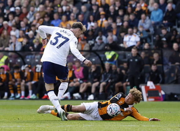 Kingston upon Hull, England, 11th October 2026. Regan Slater of Hull City tackles James Garner of Everton during the Hull City vs Everton Premier League match at the MKM Stadium, Kingston upon Hull. Picture credit should read: Cody Froggatt Sportimage EDITORIAL USE ONLY. No use with unauthorised audio, video, data, fixture lists, club league logos or live services. Online in-match use limited to 120 images, no video emulation. No use in betting, games or single club league player publications. SPI_024_CF_HULL_CITY_EVERTON SPI-5062-0023