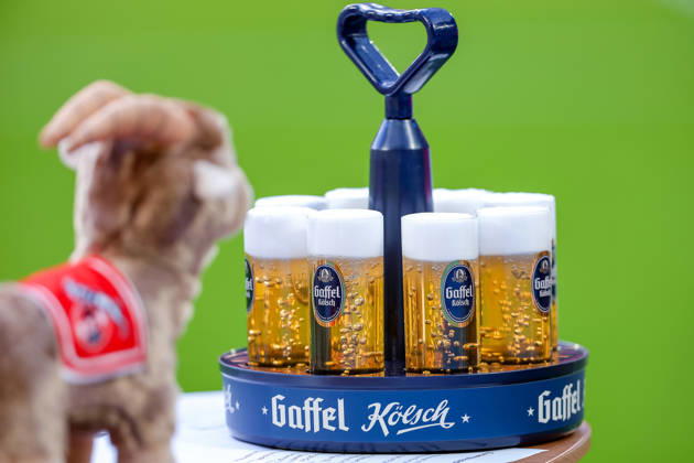 October 11, 2026, xkwix, Soccer, Bundesliga, 1. FC Köln vs. Borussia Mönchengladbach, RheinEnergieSTADION, Matchday 5, 2026–2027 season. A man wearing a Gaffel Kölsch T-shirt with the Hennes goat mascot in the foreground. DFB regulations prohibit any use of photographs as image sequences and or quasi-video. Photo: xKamilxWilkowskixPressefotoKochx, North Rhine-Westphalia, Germany