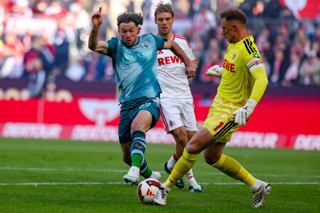 October 11, 2026, xkwix, Soccer, Bundesliga, 1. FC Köln vs. Borussia Mönchengladbach, RheinEnergieSTADION, Matchday 5, 2026–2027 Season: Florian Neuhaus of Borussia Mönchengladbach (No. 10) in a tackle against Marvin Schwaebe of 1. FC Köln (No. 1). DFB regulations prohibit any use of photographs as image sequences and or quasi-video. Photo: xKamilxWilkowskixPressefotoKochx, North Rhine-Westphalia, Germany