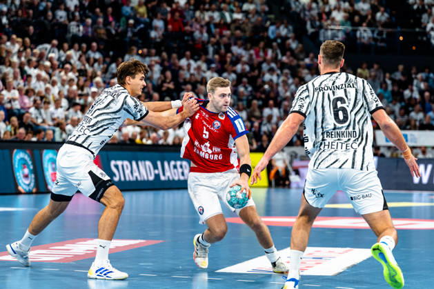 October 11, 2026, xdobgx, Opel HBL Handball, THW Kiel vs. Handball Club Hamburg: Julian Köster (Kiel), 7; Oliver Norlyk (Handball Club Hamburg), 5; Harald Reinkind (Kiel), 6; Kiel