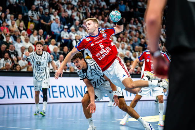 October 11, 2026, xdobgx, Opel HBL Handball, THW Kiel vs. Handball Club Hamburg; Julian Köster (Kiel), 7; Oliver Norlyk (Handball Club Hamburg), 5, shooting, in action, shooting at Kiel