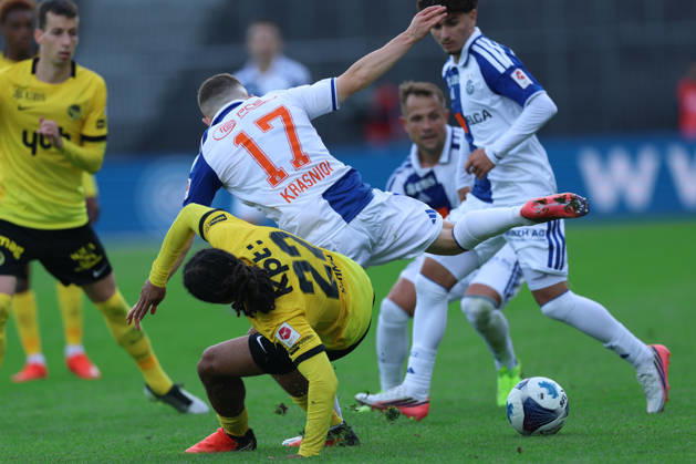 GC Zurich vs. BSC Young Boys, Brack Super League, October 11, 2026: Isaac Schmidt, 22, BSC Young Boys, left, and Samuel Krasniqi, 17, Grasshopper Club Zurich, in the Brack Super League match between Grasshopper Club Zurich (GCZ) and BSC Young Boys (YB) on October 11, 2026, at Letzigrund Stadium in Zurich, Switzerland. Zurich, Letzigrund Stadium, Zurich, Switzerland