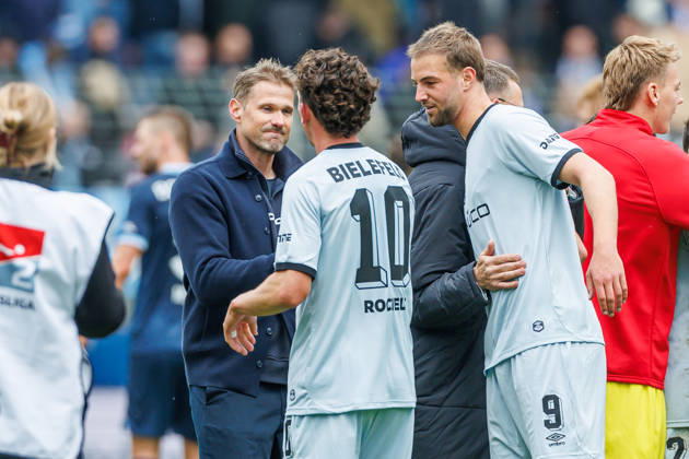 Coach Oliver Kirch of DSC Arminia Bielefeld, Jannik Rochelt of DSC Arminia Bielefeld and Noel Futkeu of DSC Arminia Bielefeld celebrate after the 0–1 victory during the 2. Bundesliga match between VfL Bochum and Arminia Bielefeld, at the Ruhrstadion on October 11, 2026, in Bochum, Germany. Photo by Mario Hommes, DeFodi Images. Coach Oliver Kirch of DSC Arminia Bielefeld, Jannik Rochelt of DSC Arminia Bielefeld and Noel Futkeu of DSC Arminia Bielefeld celebrate after winning during the 2. Bundesliga match between VfL Bochum and Arminia Bielefeld at Vonovia Ruhrstadion on October 11, 2026 in Bochum, Germany. Photo by Mario Hommes, DeFodi Images. DFB and DFL regulations prohibit any use of photographs as image sequences and or quasi-video. Photo by Mario Hommes, DeFodi Images.
