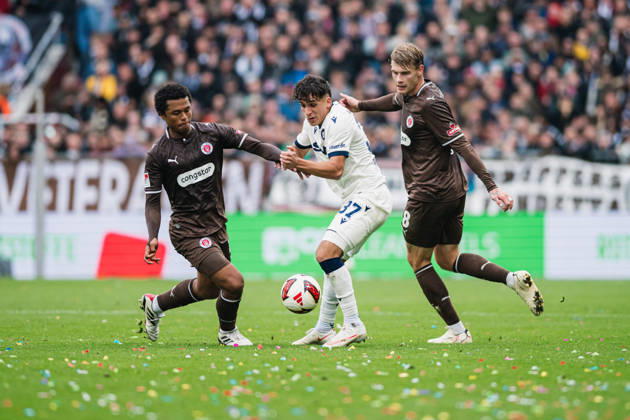 2. Bundesliga: FC St. Pauli vs. Karlsruher SC, October 11, 2026—Joel Fujita (FC St. Pauli, 16) and Eric Smith (FC St. Pauli, 8) vs. Jason Ponente Ramirez (Karlsruher SC, 37)—Soccer, 2. Bundesliga, Matchday 7: FC St. Pauli vs. Karlsruher SC on October 11, 2026, at Millerntor Stadium, Hamburg. DFL regulations prohibit any use of photographs as image sequences and or quasi-video. Copyright: xBEAUTIFULxSPORTS Tonhäuserx