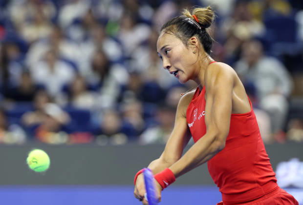 (261011) -- BEIJING, Oct. 11, 2026 -- Zheng Qinwen hits a return during the women s singles final between Zheng Qinwen of China and Mirra Andreeva of Russia at 2026 China Open tennis tournament in Beijing, China, Oct. 11, 2026. ) (SP)CHINA-BEIJING-TENNIS-CHINA OPEN-WOMEN S SINGLES-FINAL (CN) ZhangxChenlin