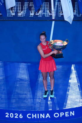 (261011) -- BEIJING, Oct. 11, 2026 -- Zheng Qinwen poses with the trophy during the awarding ceremony after the women s singles final between Zheng Qinwen of China and Mirra Andreeva of Russia at 2026 China Open tennis tournament in Beijing, China, Oct. 11, 2026. ) (SP)CHINA-BEIJING-TENNIS-CHINA OPEN-WOMEN S SINGLES-FINAL (CN) JuxHuanzong