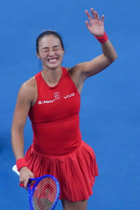 (261011) -- BEIJING, Oct. 11, 2026 -- Zheng Qinwen celebrates victory after the women s singles final between Zheng Qinwen of China and Mirra Andreeva of Russia at 2026 China Open tennis tournament in Beijing, China, Oct. 11, 2026. ) (SP)CHINA-BEIJING-TENNIS-CHINA OPEN-WOMEN S SINGLES-FINAL (CN) JuxHuanzong