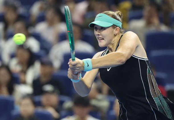 (261011) -- BEIJING, Oct. 11, 2026 -- Mirra Andreeva hits a return during the women s singles final between Zheng Qinwen of China and Mirra Andreeva of Russia at 2026 China Open tennis tournament in Beijing, China, Oct. 11, 2026. ) (SP)CHINA-BEIJING-TENNIS-CHINA OPEN-WOMEN S SINGLES-FINAL (CN) ZhangxChenlin