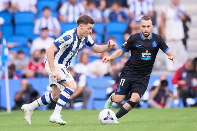 October 11, 2026, San Sebastian, Guipuzcoa, Spain: Sergio Gomez of Real Sociedad competes for the ball with David Mella of RC Deportivo de A Coruna during the LaLiga EA Sports match between Real Sociedad and RC Deportivo de A Coruna at Anoeta on October 11, 2026, in San Sebastian, Spain. Real Sociedad V RC Deportivo De La Coruna - La Liga EA Sports - ZUMAa181 20261011_zaa_a181_124 Copyright: xRicardoxLarreinax