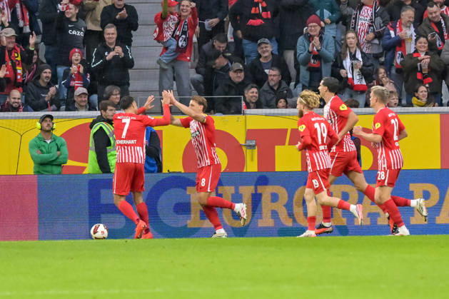 Celebration after Maximilian Eggestein of SC Freiburg (08) scored the 1–0 goal with Derry Scherhant of SC Freiburg, 07 and his teammates GER, SC Freiburg vs. Schalke 04, soccer, Bundesliga, Matchday 5, 2026–2027 season, October 11, 2026. DFL and DFB regulations prohibit any use of photographs as image sequences and or quasi-video. GER, SC Freiburg vs. Schalke 04, soccer, Bundesliga, Matchday 5, 2026–2027 season, October 11, 2026, Freiburg Copyright: xEibner-Pressefotox EP_THS