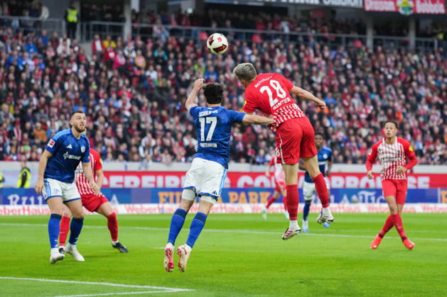 1 Bundesliga: SC Freiburg vs. FC Schalke 04, October 11, 2026—Heading duel between Adrian Gantenbein (FC Schalke 04, No. 17) and Matthias Ginter (SC Freiburg, No. 28). 1 Bundesliga: SC Freiburg vs. FC Schalke 04, Europa-Park Stadium, October 11, 2026 DFB and DFL regulations prohibit any use of photographs as image sequences and or quasi-video. Copyright: xBEAUTIFULxSPORTS Boscox