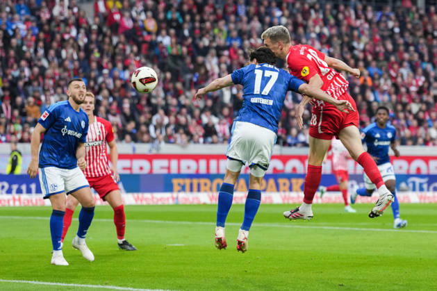 1 Bundesliga: SC Freiburg vs. FC Schalke 04, October 11, 2026—Heading duel between Adrian Gantenbein (FC Schalke 04, No. 17) and Matthias Ginter (SC Freiburg, No. 28). 1 Bundesliga: SC Freiburg vs. FC Schalke 04, Europa-Park Stadium, October 11, 2026 DFB and DFL regulations prohibit any use of photographs as image sequences and or quasi-video. Copyright: xBEAUTIFULxSPORTS Boscox