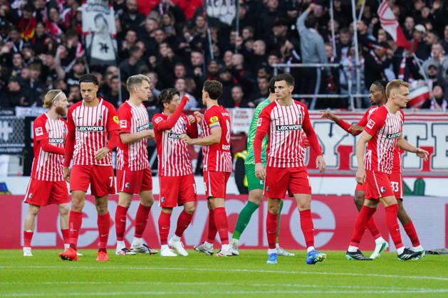 1 Bundesliga: SC Freiburg vs. FC Schalke 04, October 11, 2026. The Freiburg players high-fiving each other before the game. 1 Bundesliga: SC Freiburg vs. FC Schalke 04, Europa-Park Stadium, October 11, 2026 DFB and DFL regulations prohibit any use of photographs as image sequences and or quasi-video. Copyright: xBEAUTIFULxSPORTS Boscox