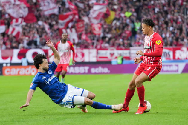 1 Bundesliga: SC Freiburg vs. FC Schalke 04, October 11, 2026; Tackle between Adrian Gantenbein (FC Schalke 04, No. 17) and Derry Scherhant (SC Freiburg, No. 7); 1 Bundesliga: SC Freiburg vs. FC Schalke 04, Europa-Park Stadium, October 11, 2026 DFB and DFL regulations prohibit any use of photographs as image sequences and or quasi-video. Copyright: xBEAUTIFULxSPORTS Boscox