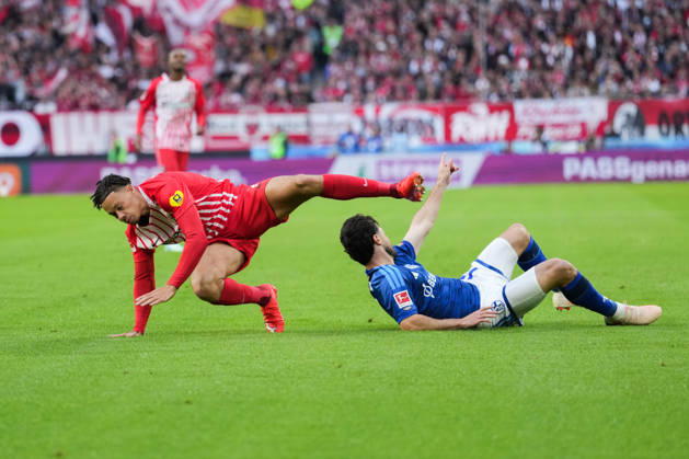 1 Bundesliga: SC Freiburg vs. FC Schalke 04, October 11, 2026; Tackle between Adrian Gantenbein (FC Schalke 04, No. 17) and Derry Scherhant (SC Freiburg, No. 7); 1 Bundesliga: SC Freiburg vs. FC Schalke 04, Europa-Park Stadium, October 11, 2026 DFB and DFL regulations prohibit any use of photographs as image sequences and or quasi-video. Copyright: xBEAUTIFULxSPORTS Boscox