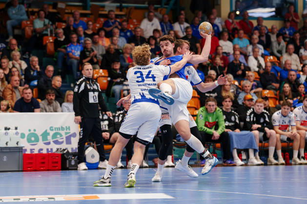 2nd Handball Bundesliga, Matchday 7: Dessau Roßlauer HV 06 vs. VfL Lübeck Schwartau; Marcel Nowak (Dessau Roßlauer HV 06, No. 15) is guarded by Thore Kjell Heinemann (VfL Lübeck Schwartau), 34 on October 11, 2026, at the Anhalt Arena, Dessau-Roßlau, Saxony-Anhalt, Dessau-Roßlau, Anhalt Arena, Saxony-Anhalt, Germany