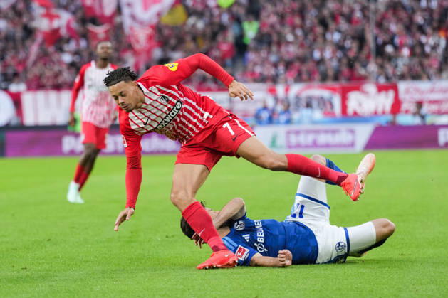 1 Bundesliga: SC Freiburg vs. FC Schalke 04, October 11, 2026; Tackle between Adrian Gantenbein (FC Schalke 04, No. 17) and Derry Scherhant (SC Freiburg, No. 7); 1 Bundesliga: SC Freiburg vs. FC Schalke 04, Europa-Park Stadium, October 11, 2026 DFB and DFL regulations prohibit any use of photographs as image sequences and or quasi-video. Copyright: xBEAUTIFULxSPORTS Boscox