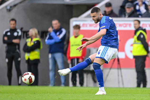 Hasan Kurucay of FC Schalke 04 in action, on the ball, making a solo play during the Bundesliga match between Sport Club Freiburg and FC Schalke 04 at Europa-Park Stadium on October 11, 2026, in Freiburg im Breisgau, Germany Photo by Harry Langer DeFodi Images Hasan Kurucay of FC Schalke 04 controls the ball during the Bundesliga match between Sport Club Freiburg and FC Schalke 04 at Europa Park Stadium on October 11, 2026, in Freiburg im Breisgau, Germany. Photo by Harry Langer, DeFodi Images. DFB and DFL regulations prohibit any use of photographs as image sequences and or quasi-video. Photo by Harry Langer, DeFodi Images. DFB and DFL regulations prohibit any use of photographs as imSEQUENCES AND OR QUASI-VIDEO