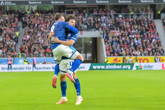 Celebration of the 1-1 goal by Adrian Gantenbein (FC Schalke 04), 17 with Robin Gosens (FC Schalke 04), 08 GER, SC Freiburg vs. Schalke 04, Soccer, Bundesliga, Matchday 5, 2026–2027 Season, October 11, 2026 DFL DFB regulations prohibit any use of photographs as image sequences and or quasi-video GER, SC Freiburg vs. Schalke 04, soccer, Bundesliga, Matchday 5, 2026–2027 season, October 11, 2026, Freiburg Copyright: xEibner-Pressefotox EP_THS
