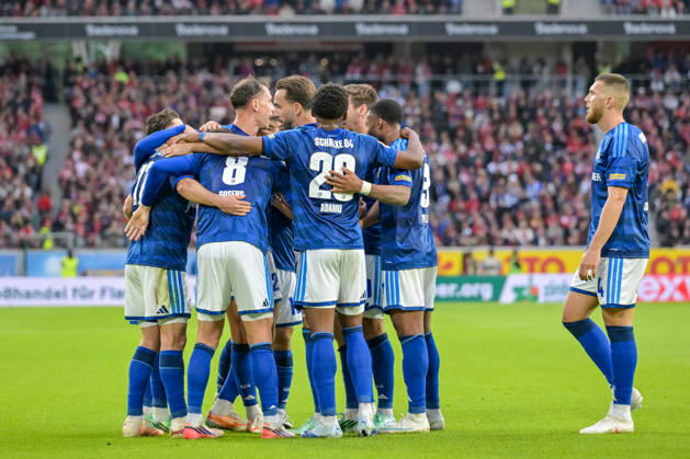 Celebration of the goal that tied the score at 1–1 by Adrian Gantenbein (FC Schalke 04, 17) with Robin Gosens (FC Schalke 04, 08, Junior Adamu of FC Schalke 04, 20, and the team (GER), SC Freiburg vs. Schalke 04, soccer, Bundesliga, Matchday 5, 2026–2027 season, October 11, 2026. DFL and DFB regulations prohibit any use of photographs as image sequences and or quasi-video. GER, SC Freiburg vs. Schalke 04, soccer, Bundesliga, Matchday 5, 2026–2027 season, October 11, 2026, Freiburg Copyright: xEibner-Pressefotox EP_THS