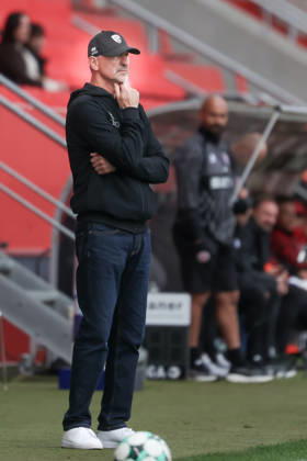 Ingolstadt, Germany, October 11, 2026, 3rd League 2026–2027, Matchday 8: FC Ingolstadt 04 vs. SV Wehen Wiesbaden. Pictured: FCI coach Achim Beierlorzer looking pensive on the field. DFB and DFL regulations prohibit any use of photographs as image sequences and or quasi-video. Copyright: xFotostandx xSchäferx