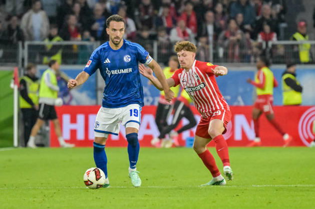 Kenan Karaman (FC Schalke 04), 19, Philipp Treu (SC Freiburg), 29, in the match GER, SC Freiburg vs. Schalke 04, soccer, Bundesliga, Matchday 5, 2026–2027 season, October 11, 2026 DFL and DFB regulations prohibit any use of photographs as image sequences and or quasi-video GER, SC Freiburg vs. Schalke 04, Soccer, Bundesliga, Matchday 5, 2026–2027 Season, October 11, 2026, Freiburg Copyright: xEibner-Pressefotox EP_THS