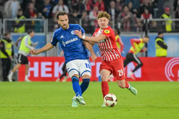 Kenan Karaman (FC Schalke 04), 19, Philipp Treu (SC Freiburg), 29, in the match GER, SC Freiburg vs. Schalke 04, soccer, Bundesliga, Matchday 5, 2026–2027 season, October 11, 2026 DFL and DFB regulations prohibit any use of photographs as image sequences and or quasi-video GER, SC Freiburg vs. Schalke 04, Soccer, Bundesliga, Matchday 5, 2026–2027 Season, October 11, 2026, Freiburg Copyright: xEibner-Pressefotox EP_THS