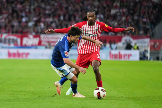 1 Bundesliga: SC Freiburg vs. FC Schalke 04, October 11, 2026—A tackle between Adrian Gantenbein (FC Schalke 04, No. 17) and Jordy Makengo (SC Freiburg, No. 33). 1 Bundesliga: SC Freiburg vs. FC Schalke 04, Europa-Park Stadium, October 11, 2026 DFB and DFL regulations prohibit any use of photographs as image sequences and or quasi-video. Copyright: xBEAUTIFULxSPORTS Boscox