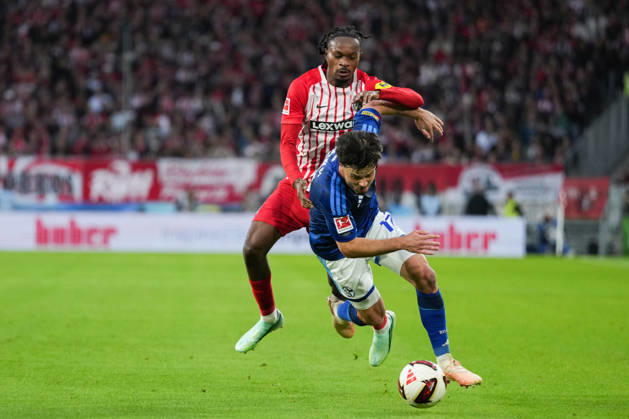 1 Bundesliga: SC Freiburg vs. FC Schalke 04, October 11, 2026—A tackle between Adrian Gantenbein (FC Schalke 04, No. 17) and Jordy Makengo (SC Freiburg, No. 33). 1 Bundesliga: SC Freiburg vs. FC Schalke 04, Europa-Park Stadium, October 11, 2026 DFB and DFL regulations prohibit any use of photographs as image sequences and or quasi-video. Copyright: xBEAUTIFULxSPORTS Boscox