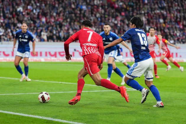1 Bundesliga: SC Freiburg vs. FC Schalke 04, October 11, 2026; Tackle between Satoshi Tanaka (FC Schalke 04, No. 13) and Derry Scherhant (SC Freiburg, No. 7); 1 Bundesliga: SC Freiburg vs. FC Schalke 04, Europa-Park Stadium, October 11, 2026 DFB and DFL regulations prohibit any use of photographs as image sequences and or quasi-video. Copyright: xBEAUTIFULxSPORTS Boscox