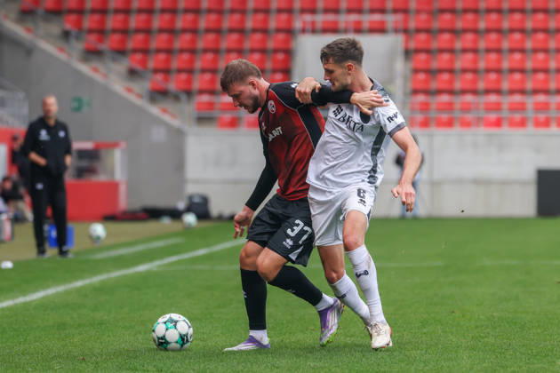 Ingolstadt, Germany October 11, 2026 3rd League 2026–2027 Matchday 8 FC Ingolstadt 04 vs. SV Wehen Wiesbaden Pictured from left in a tackle: Benjamin Kanuric (FCI) and Gino Fechner (SVWW). DFB and DFL regulations prohibit any use of photographs as image sequences and or quasi-video Copyright: xFotostandx xSchäferx